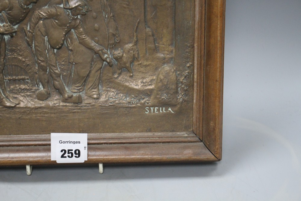 An early 20th century bronze plaque, cast in relief with Punchinello and signed Stella, 26 x 29cm, overall 32 x 36cm